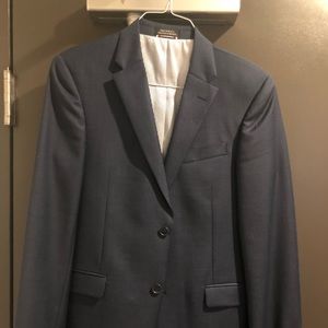 Tommy Hilfiger matching navy suit.